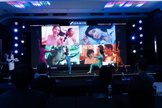 A group of people on a stageDescription automatically generated